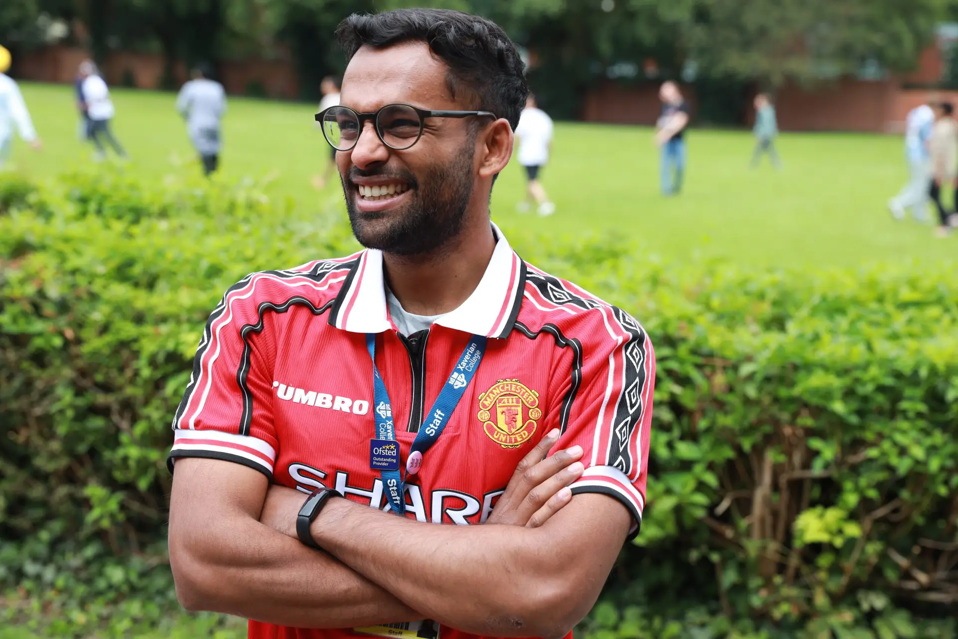 student wearning football jersey